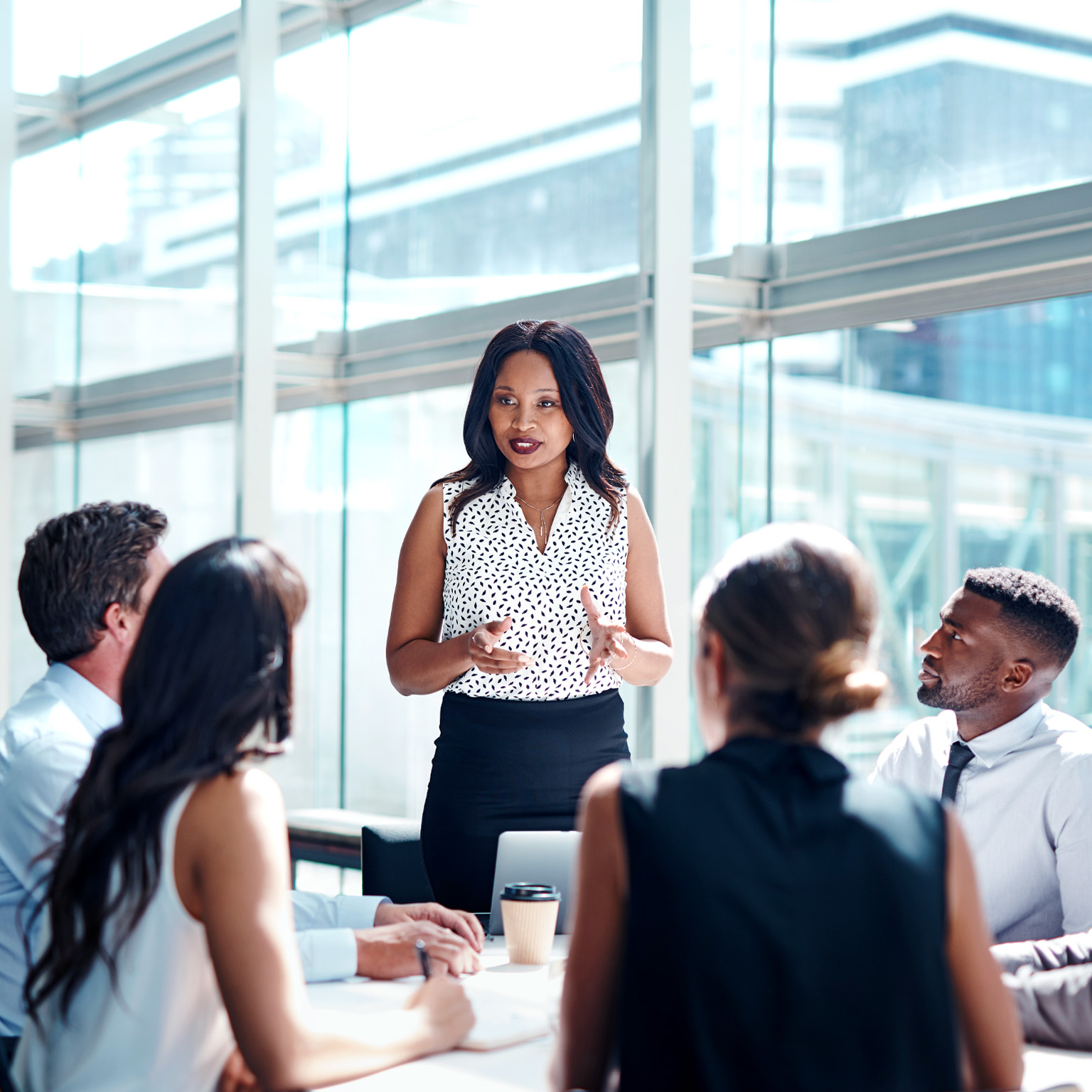 A group of people  in a discussion