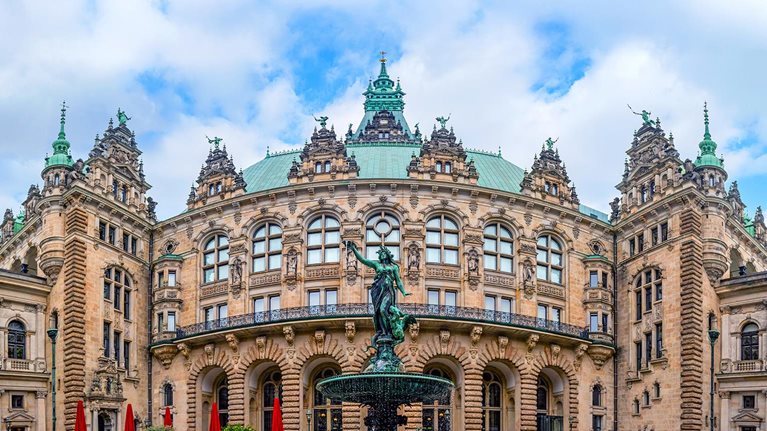 An image of the Hygieia Fountain located in the inner Courtyard of City Hall in Hamburg, Germany. It was built from 1895-1896 and designed by the sculptor Joseph von Kramer.