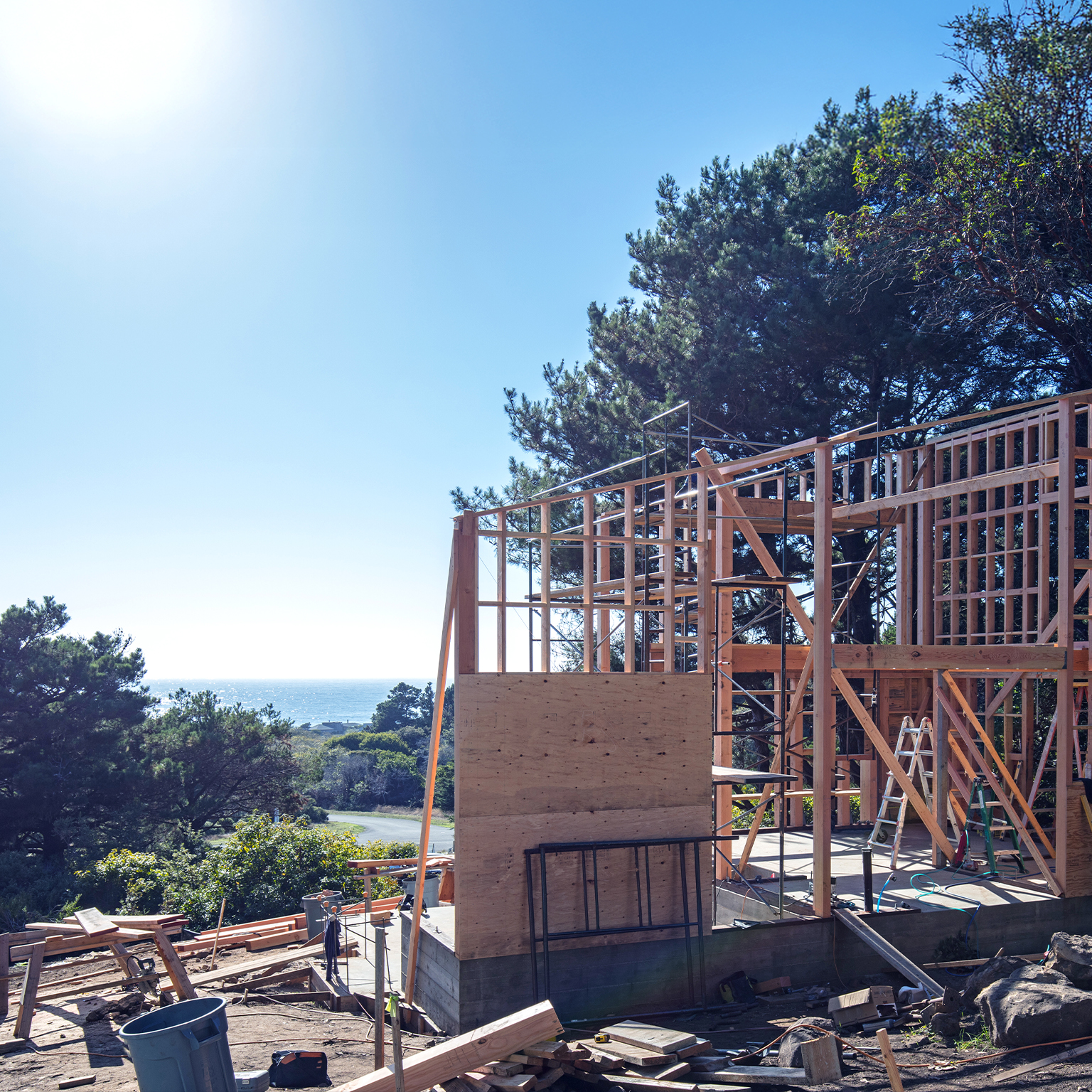 House construction framing in California by Pacific Ocean.