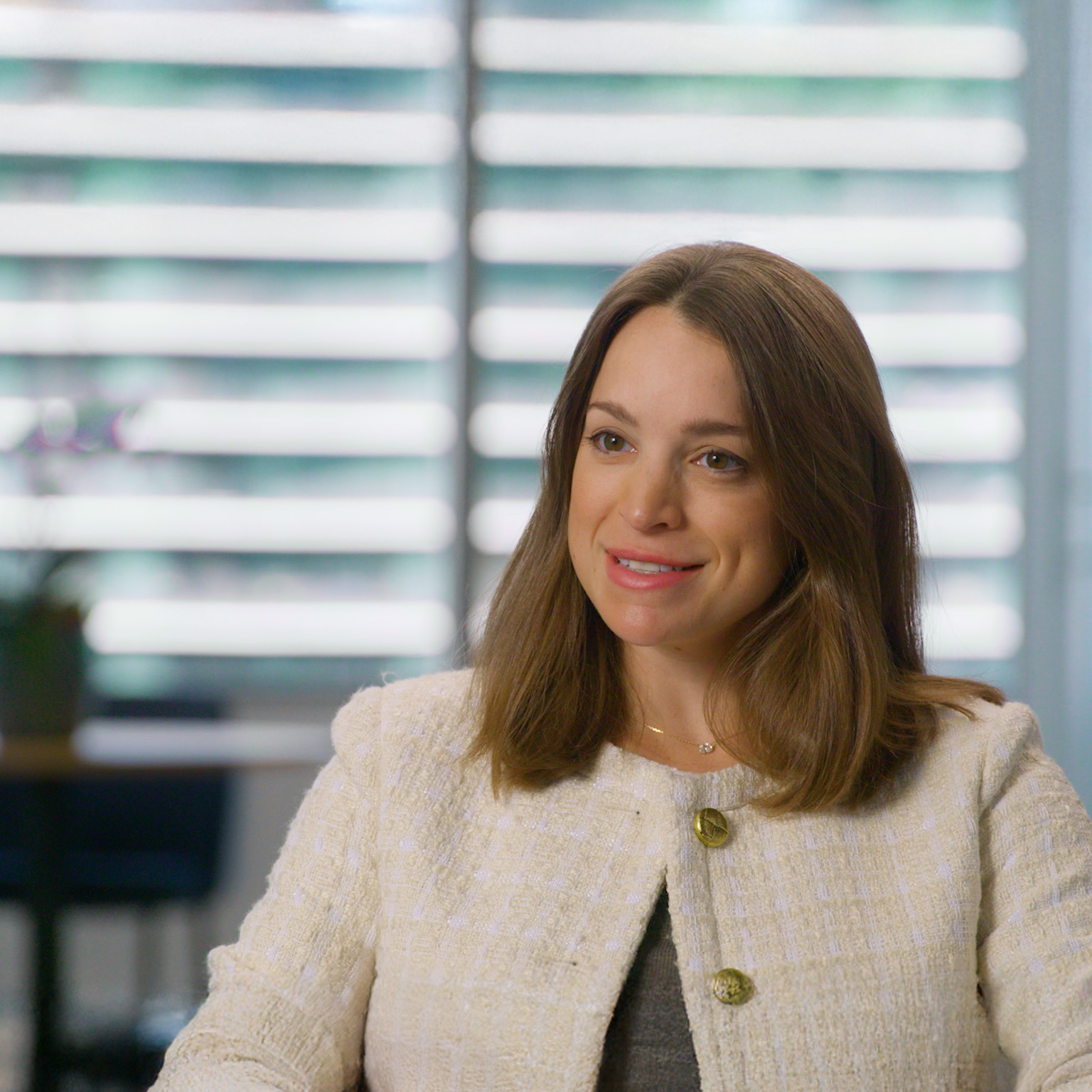 A still image of Katharine Mattox being interviewed.