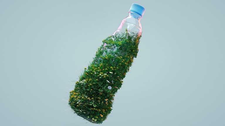 Digital generated image of grass and flowers growing on used plastic bottle against gray background.