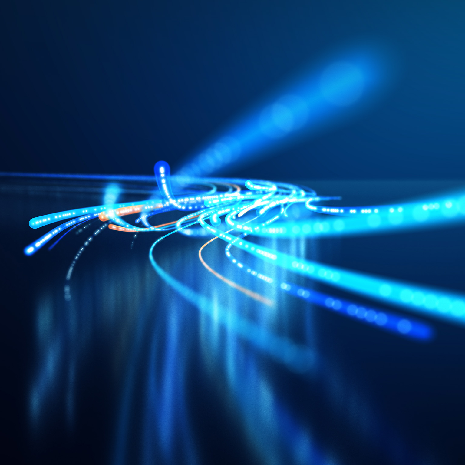 This image is a conceptual representation of fiber optic cables conveying high-speed data. It illustrates the concept of rapid data transmission through network infrastructures.