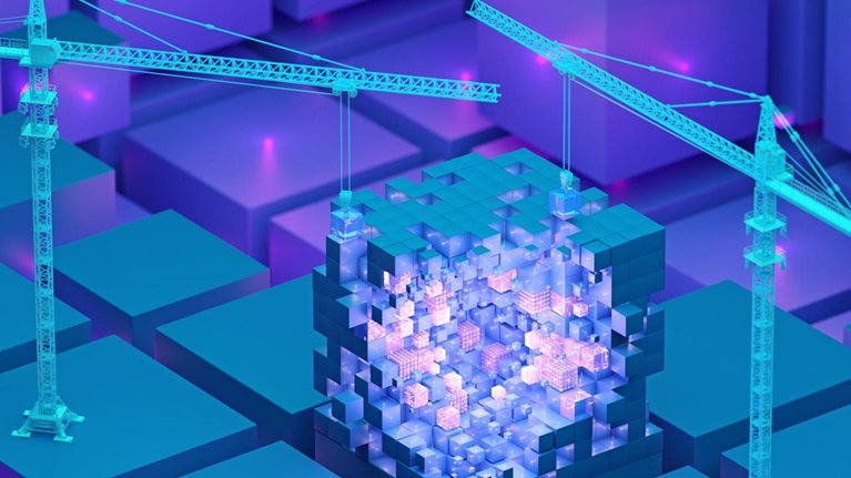Two teal construction cranes stand on opposite ends of a large, luminous cube made up of numerous smaller cubes. The cranes are carefully placing additional cubes onto the structure, hinting at the building of a digital framework.