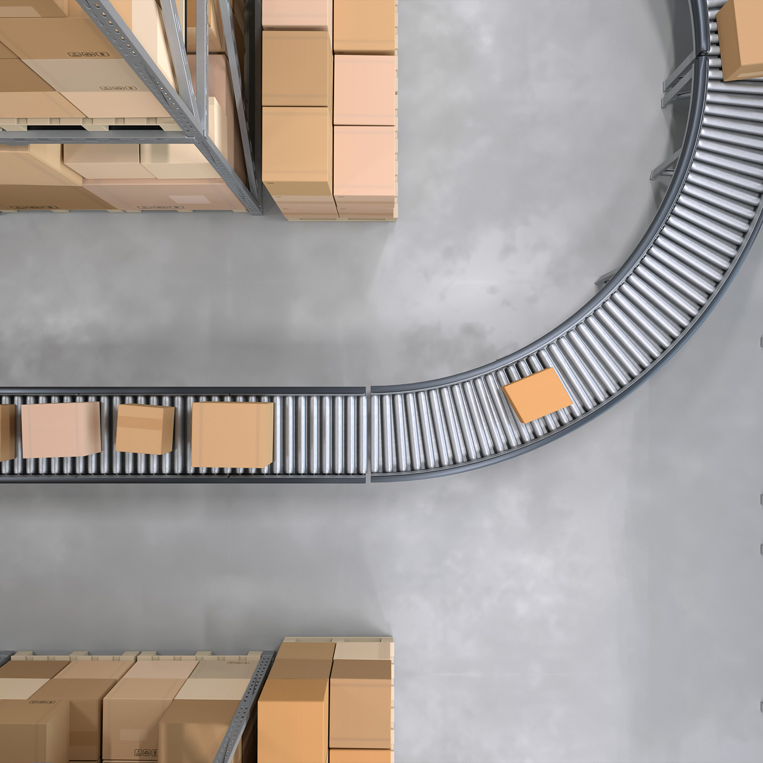 Top view of conveyor belts transporting boxes in a large warehouse - stock photo