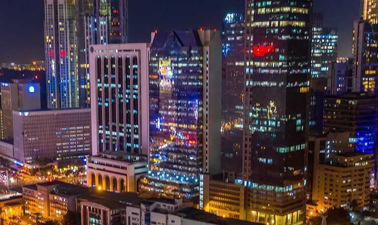 Manila, Philippines Makati timelapse aerial shot of Intersection in central city area with traffic. - stock video