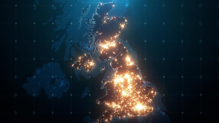 Night map of United Kingdom with city lights illuminated