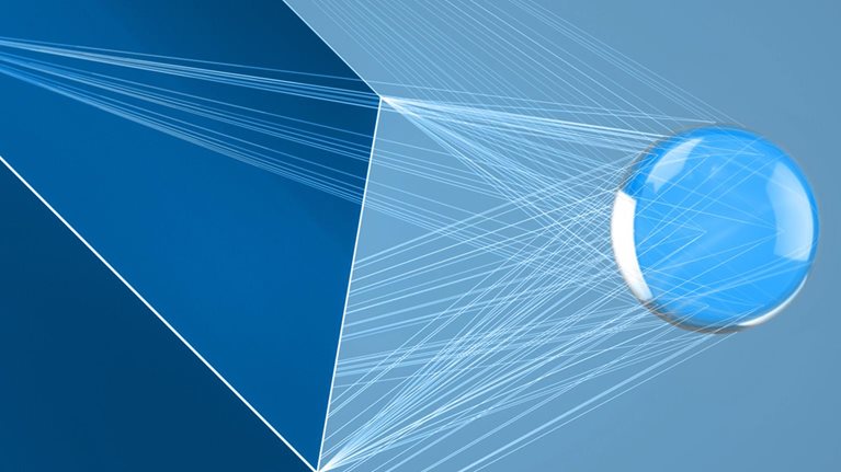 Digital generated image of spline connections between large cube and glowing sphere on blue background.